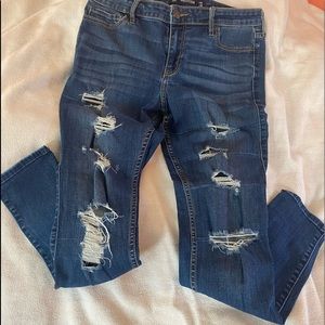 Hollister Deep blue skinny Jeans with rips in front
